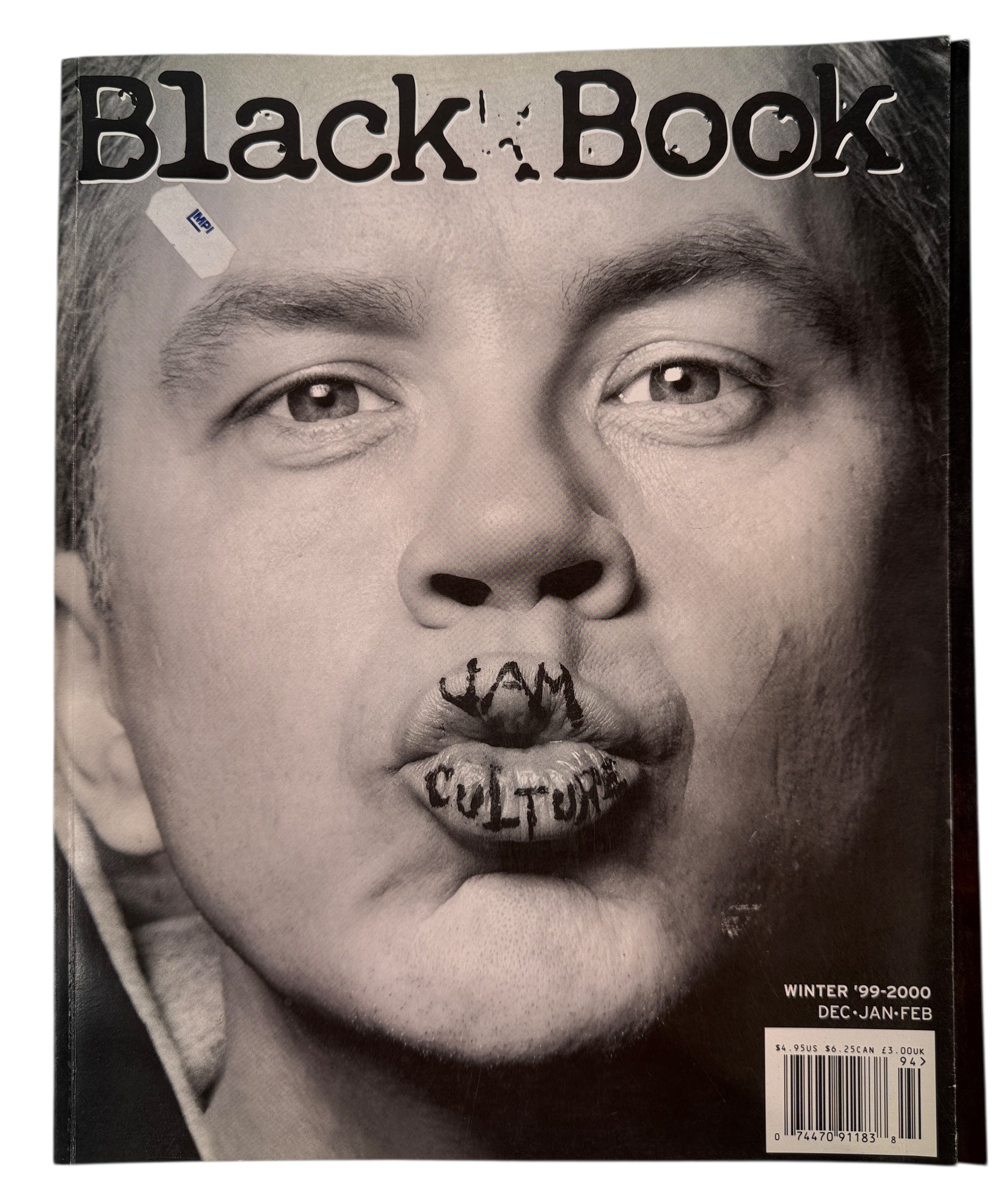Magazine cover with a black and white photo of a person with text on their lips, titled 'Black Book'.
