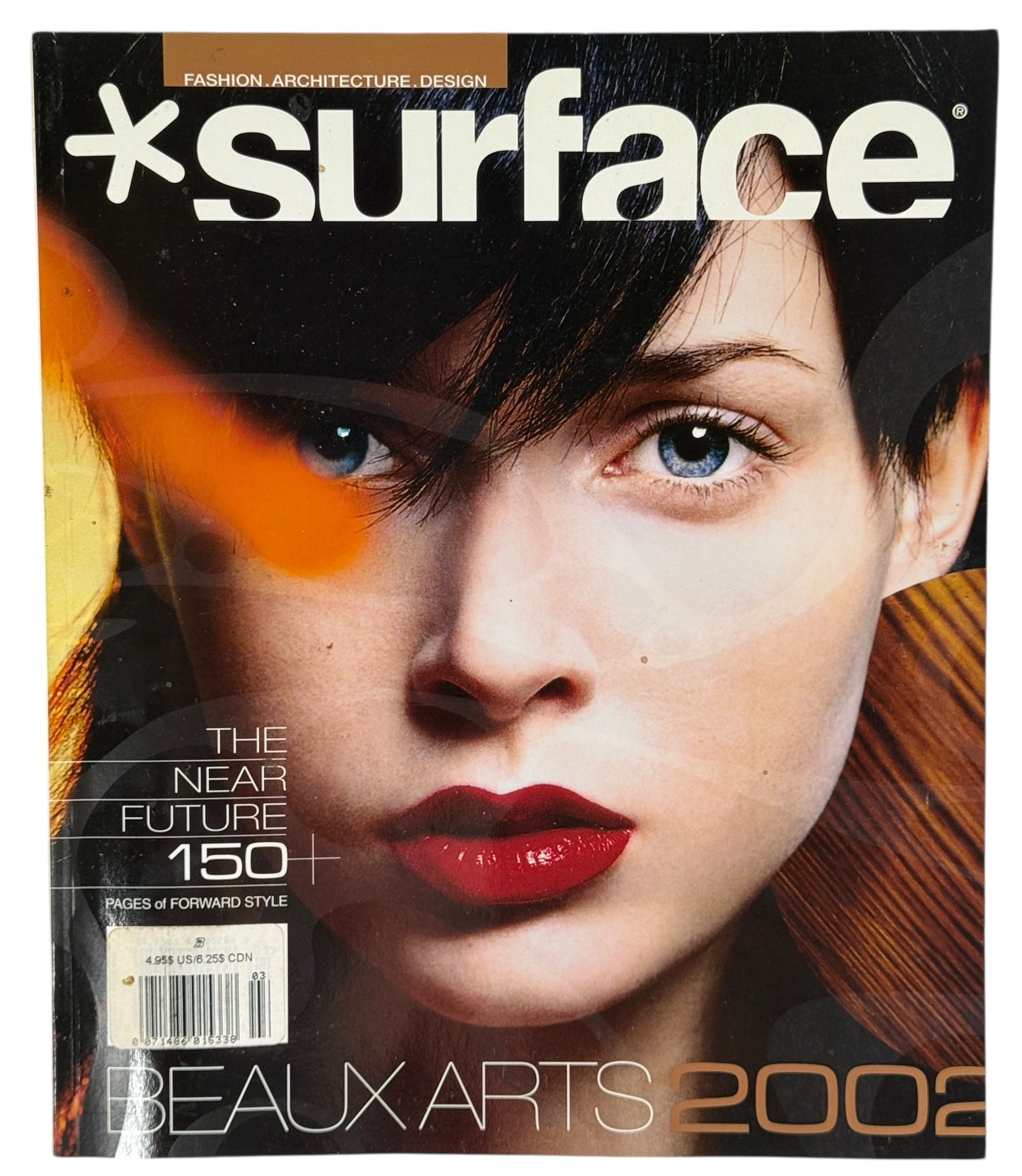 Magazine cover with a woman's face and 'Surface' branding