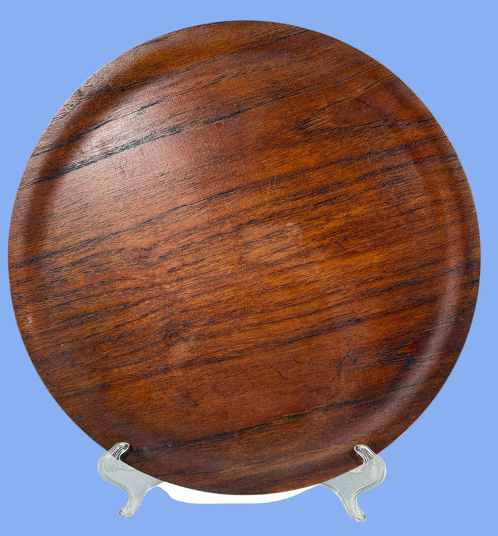 Made in Denmark Wooden round tray with metal stand on a white background