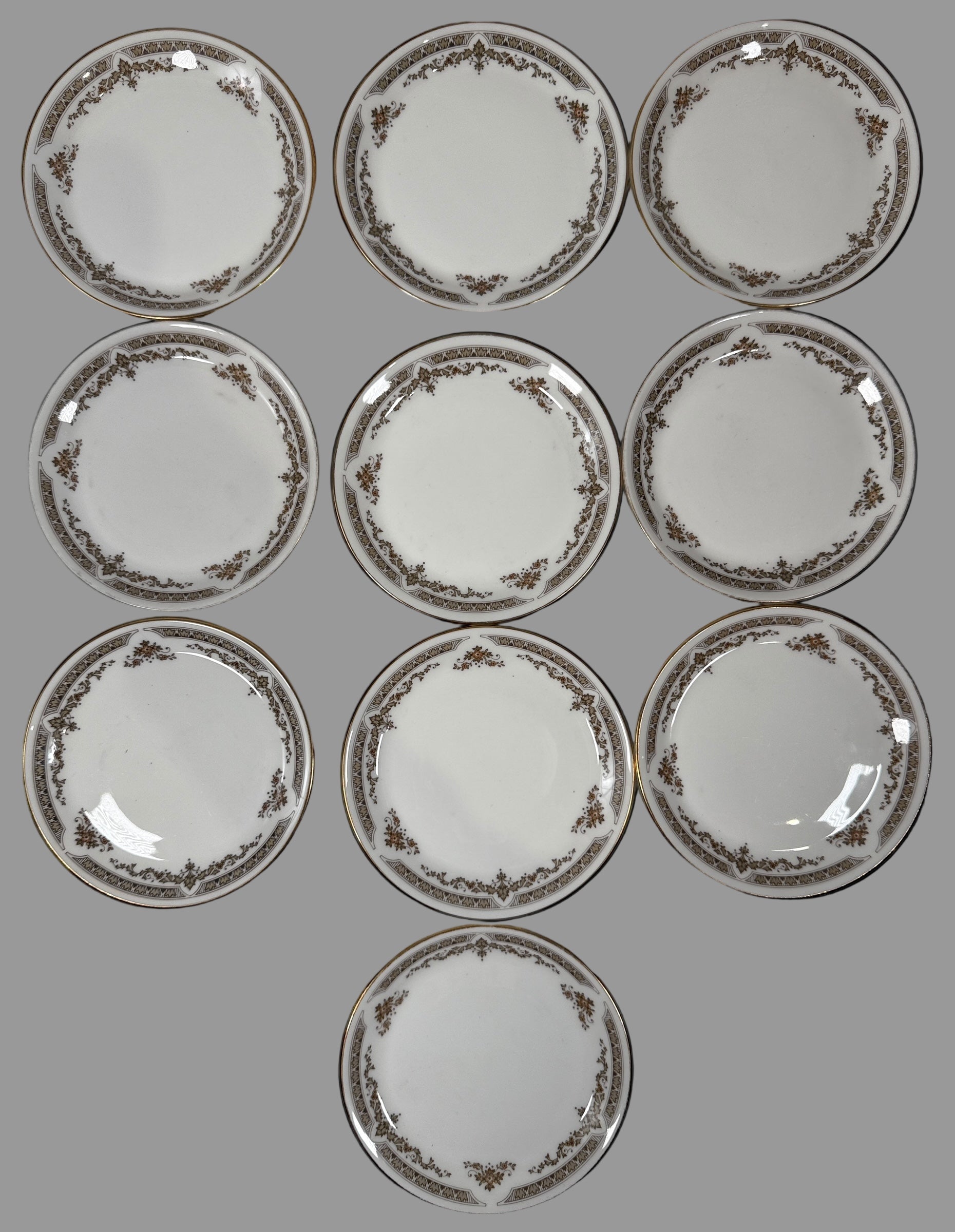 Set of 10 porcelain WArdAir, First Class plates with decorative rim on a black background