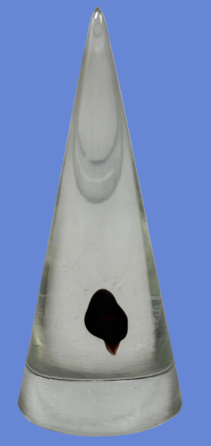 Vintage clear glass cone paperweight with dark red-brown inclusion. Mid-century modern décor collectible, polished base, unsigned art glass accent.