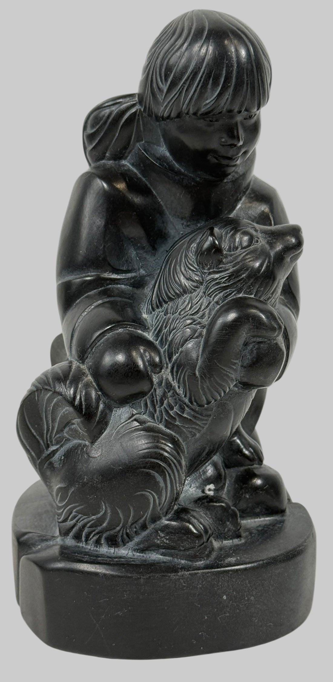 Signed BOMA Canada soapstone carving by McPhee, “Boy with Dog” Inuit-style polished black stone sculpture