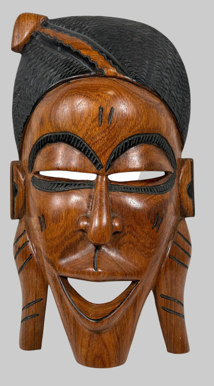 Hand-carved African wooden mask, 15″ tall, Ghana origin. Authentic tribal-style folk art wall décor. Excellent condition, solid wood.
