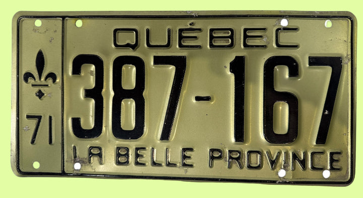 Vintage Quebec license plate with text and number