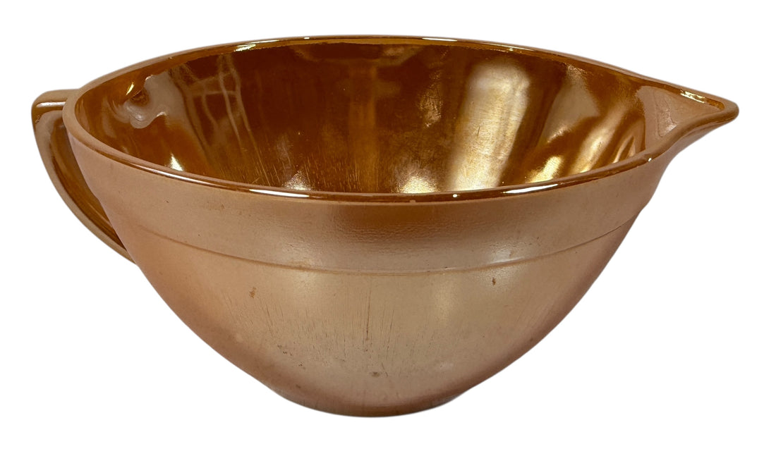 Vintage Fire-King Peach Luster mixing bowl with handle &amp; spout. Classic 1950s oven-proof milk glass collectible. Perfect for retro kitchens or display.