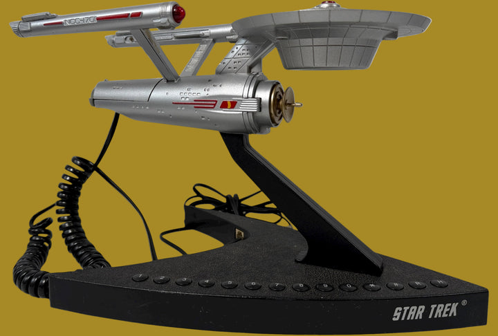 Official 1993 Telemania Star Trek USS Enterprise corded phone. Iconic NCC-1701 design, collectible display piece for Trekkies. Works and looks great.