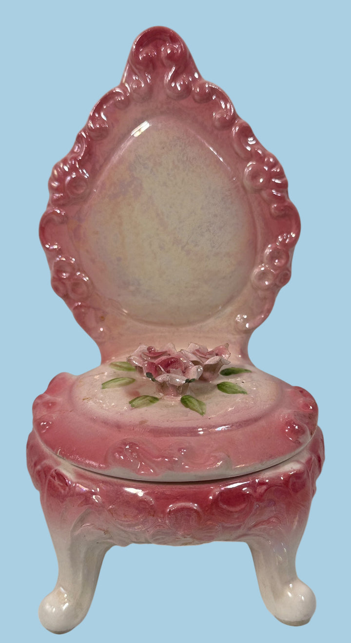 Vintage 1950s Japanese porcelain trinket box shaped like a chair with pink roses and ornate detailing. Ideal for vanity décor or small jewelry storage.
