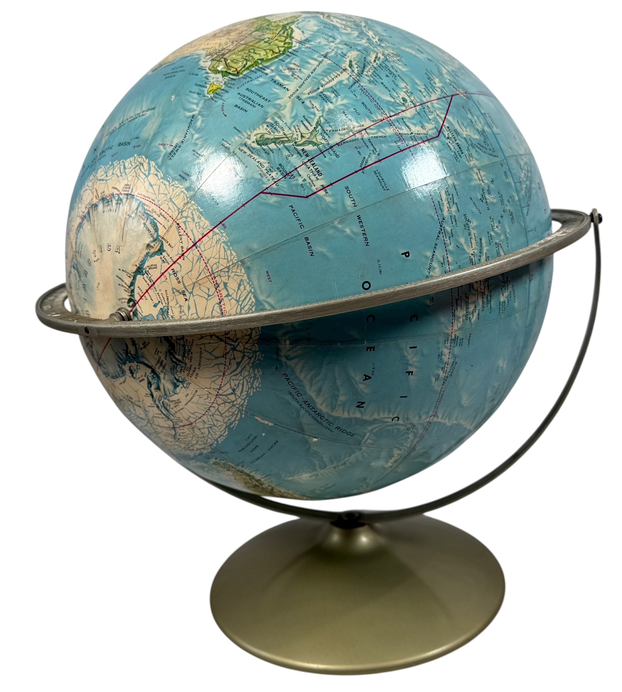 Vintage 1990 Rand McNally raised relief world globe showing USSR and unified Germany — Cold War era map with textured terrain and metal stand, Made in USA.