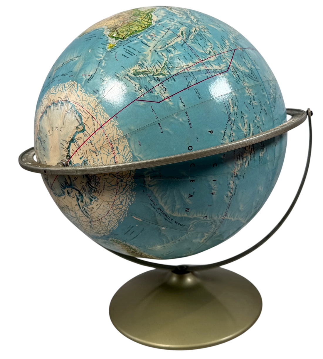 Vintage 1990 Rand McNally raised relief world globe showing USSR and unified Germany — Cold War era map with textured terrain and metal stand, Made in USA.