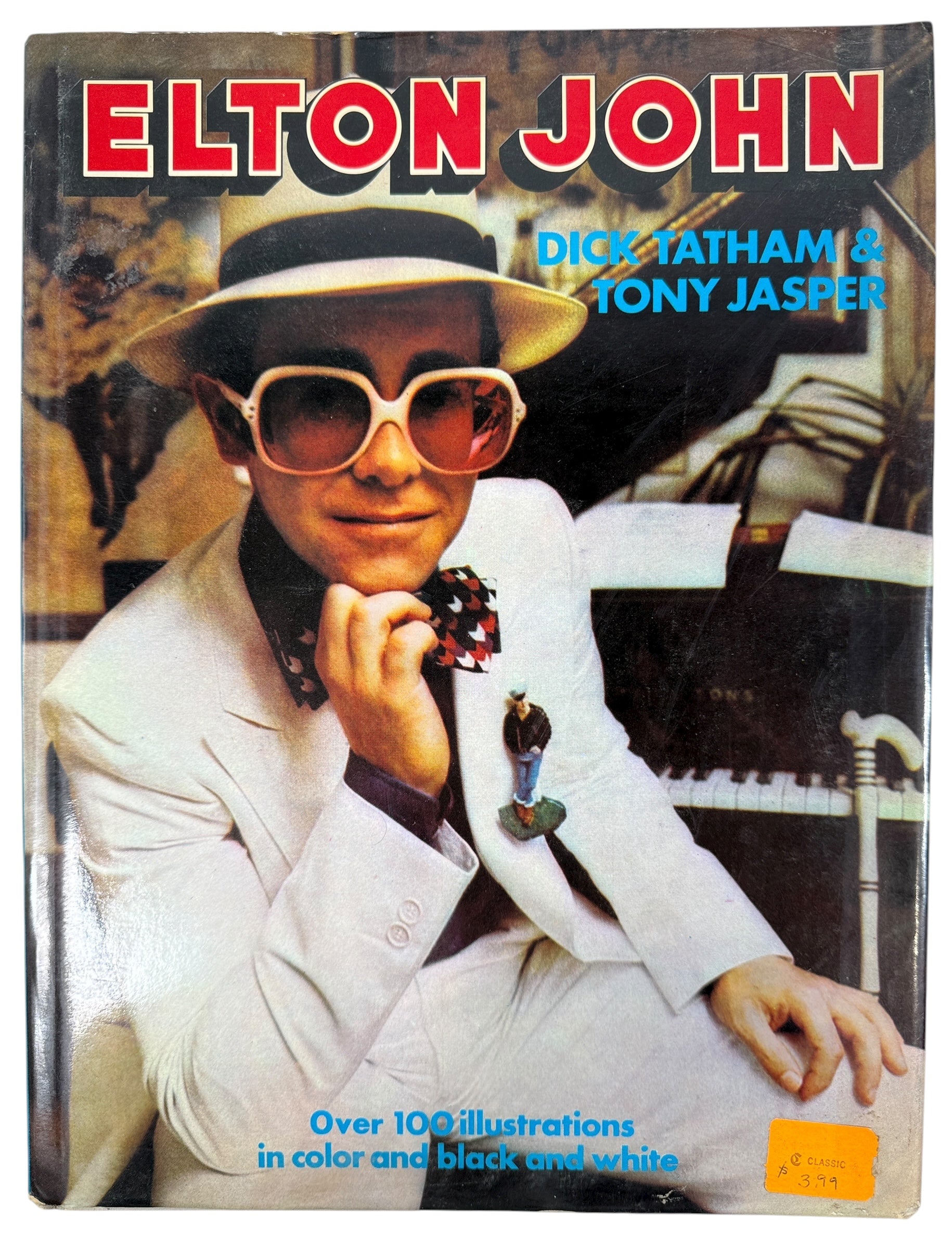 Vintage 1976 Elton John photo biography by Tatham & Jasper, Octopus Books. 100+ color photos of the Rocket Man in his prime. Collectible 70s music book.