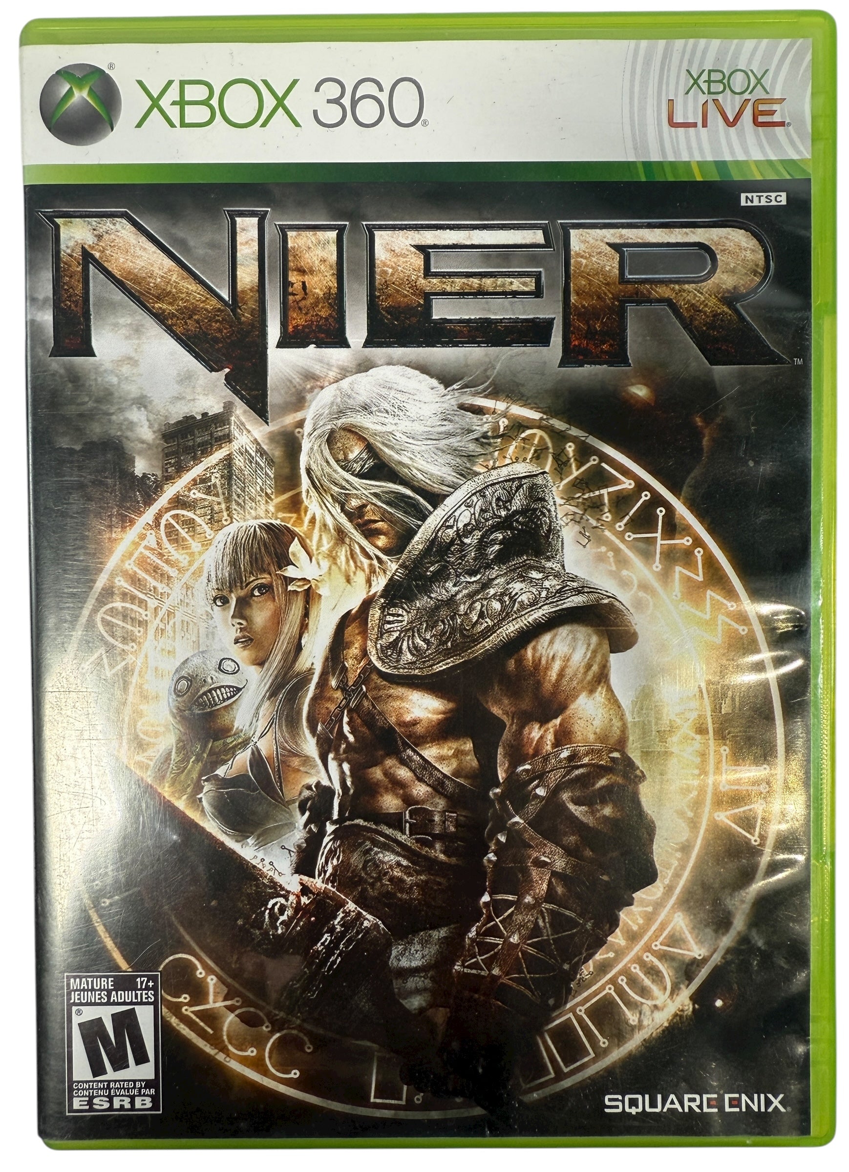 Xbox 360 game case for 'Nier' with characters and logo on a green background