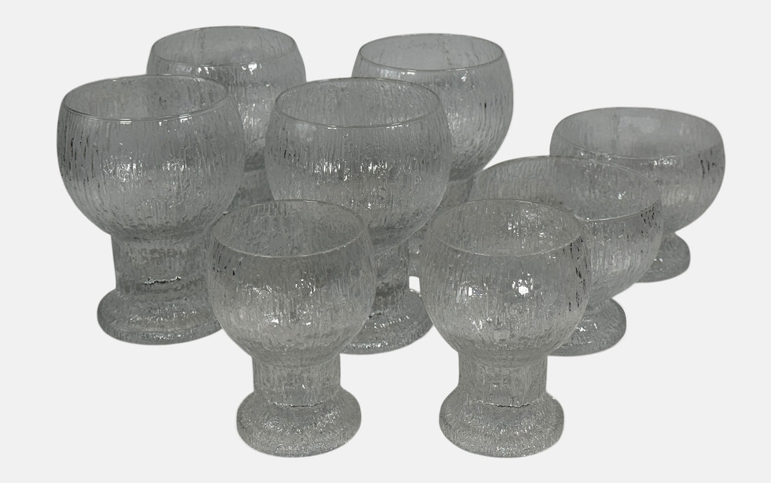 Vintage Iittala Ultima Thule footed glasses set of 8. Finnish design by Tapio Wirkkala. Iconic ice-melt texture. Excellent condition. Fast shipping from Canada.