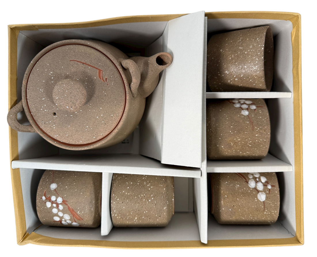 UTSUWA Japan stoneware tea set with plum blossom design, boxed with teapot and six cups. Excellent condition. Great Japanese ceramic gift set.