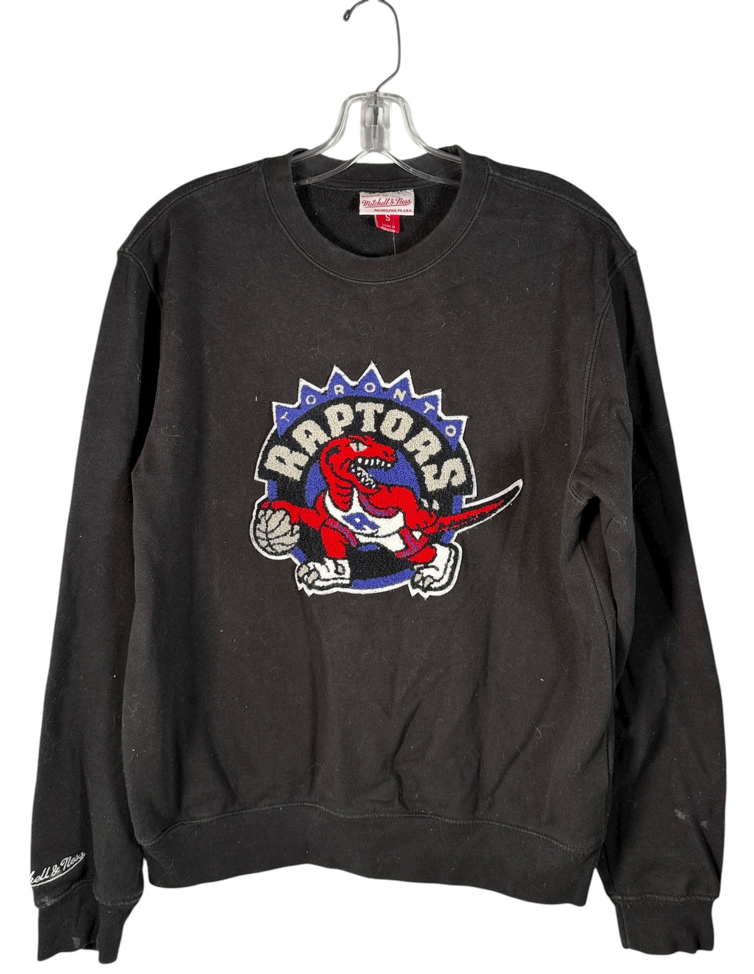 Vintage-style Toronto Raptors crewneck by Mitchell &amp; Ness with classic dinosaur logo. Clean, bold graphic. Great condition. Ships fast from Montreal.