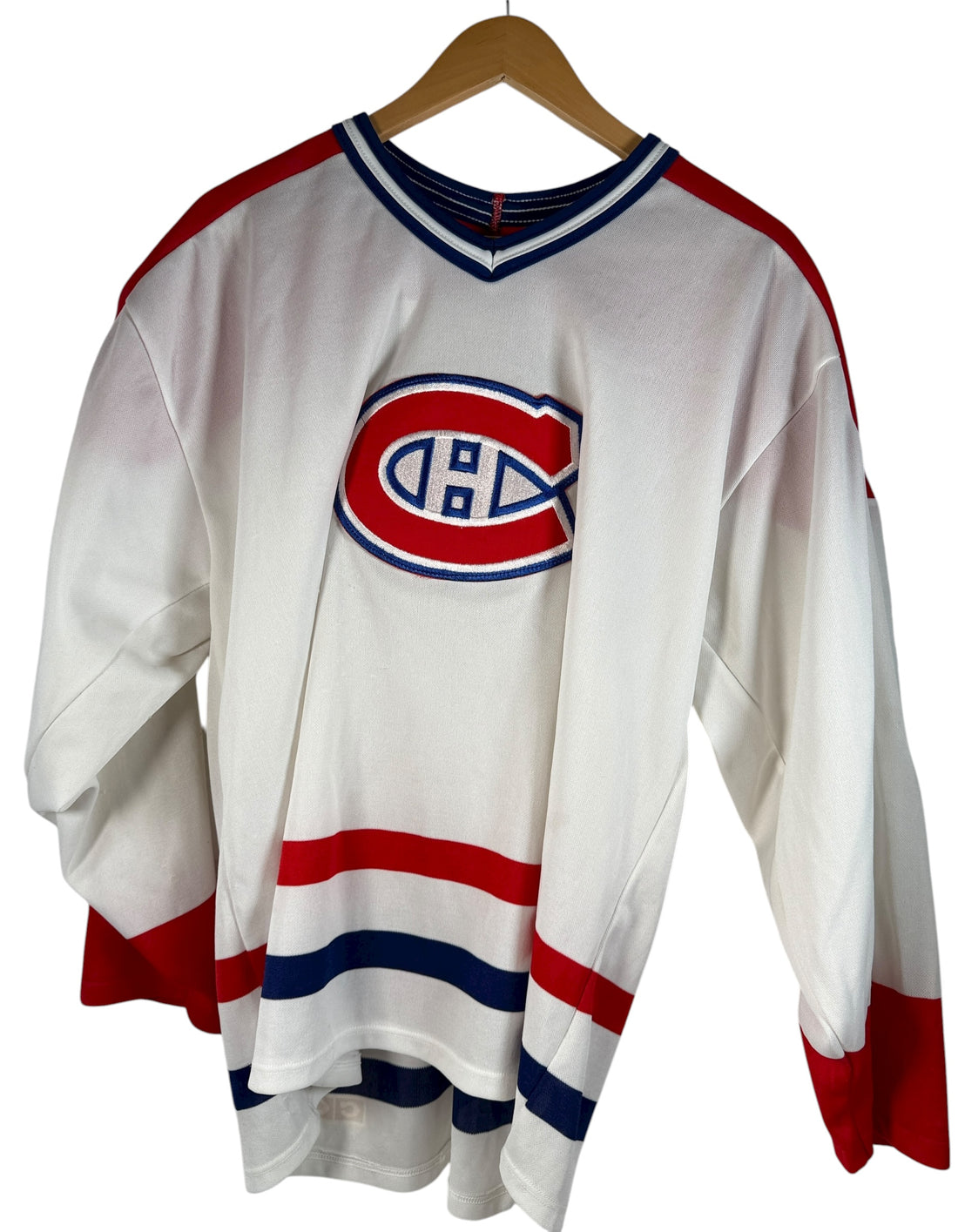 Vintage 1990s CCM Montréal Canadiens hockey jersey. Classic Habs colours, made in Canada. Clean condition. Ideal for fans and collectors.