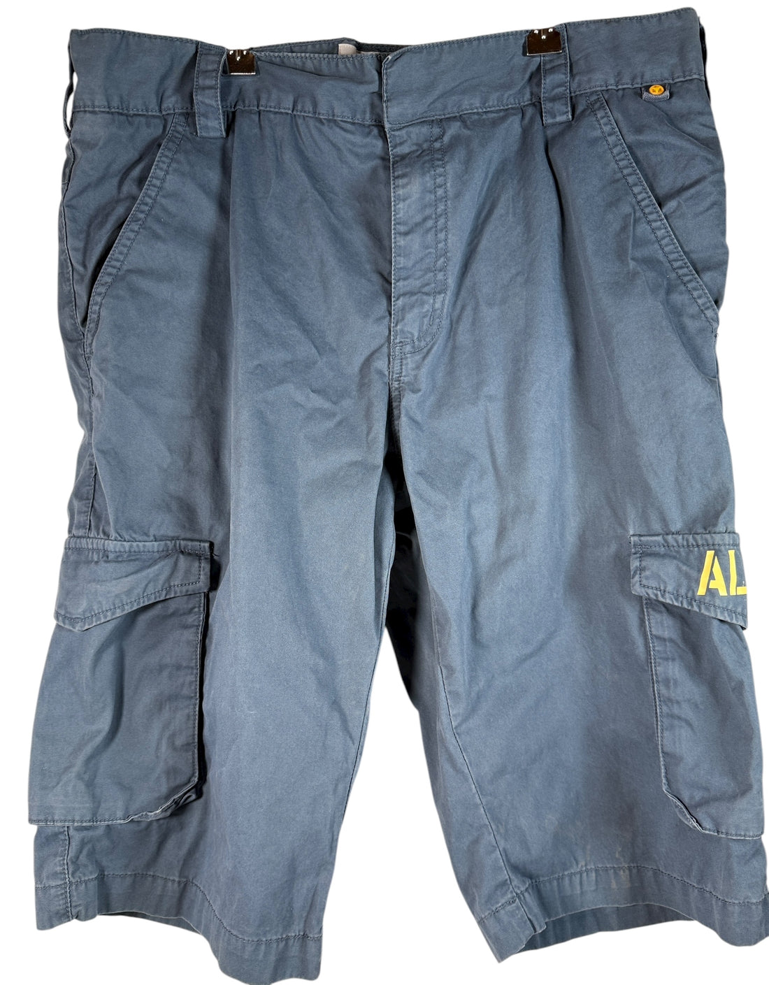 Authentic Resident Evil S.T.A.R.S. cargo shorts with official Capcom tags. Rare mid-2000s game merch in great condition. Ideal for collectors and fans.
