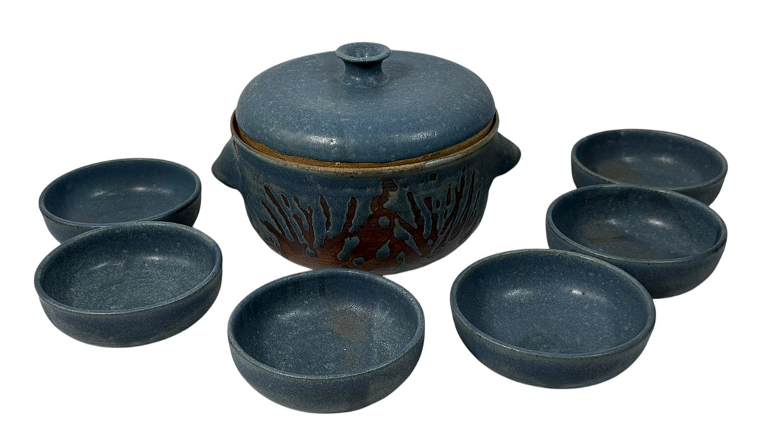 Handmade Québec studio pottery set signed Achard. Includes carved casserole with lid and six blue bowls. Vintage artisan ceramic tableware in excellent condition.