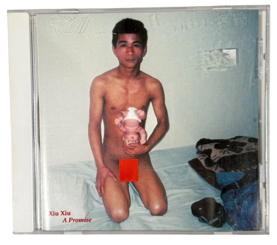 Xiu Xiu A Promise 2003 Canadian CD on 5RC. Original artwork with insert. Collectible early indie experimental release with strong fan demand.