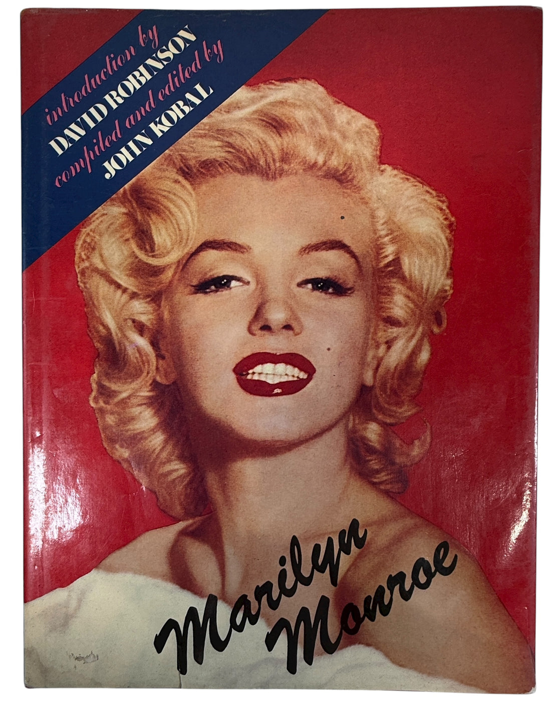 Vintage hardcover photo biography of Marilyn Monroe by John Kobal featuring rare film stills and contact sheets. Collectible Hollywood book with iconic imagery.