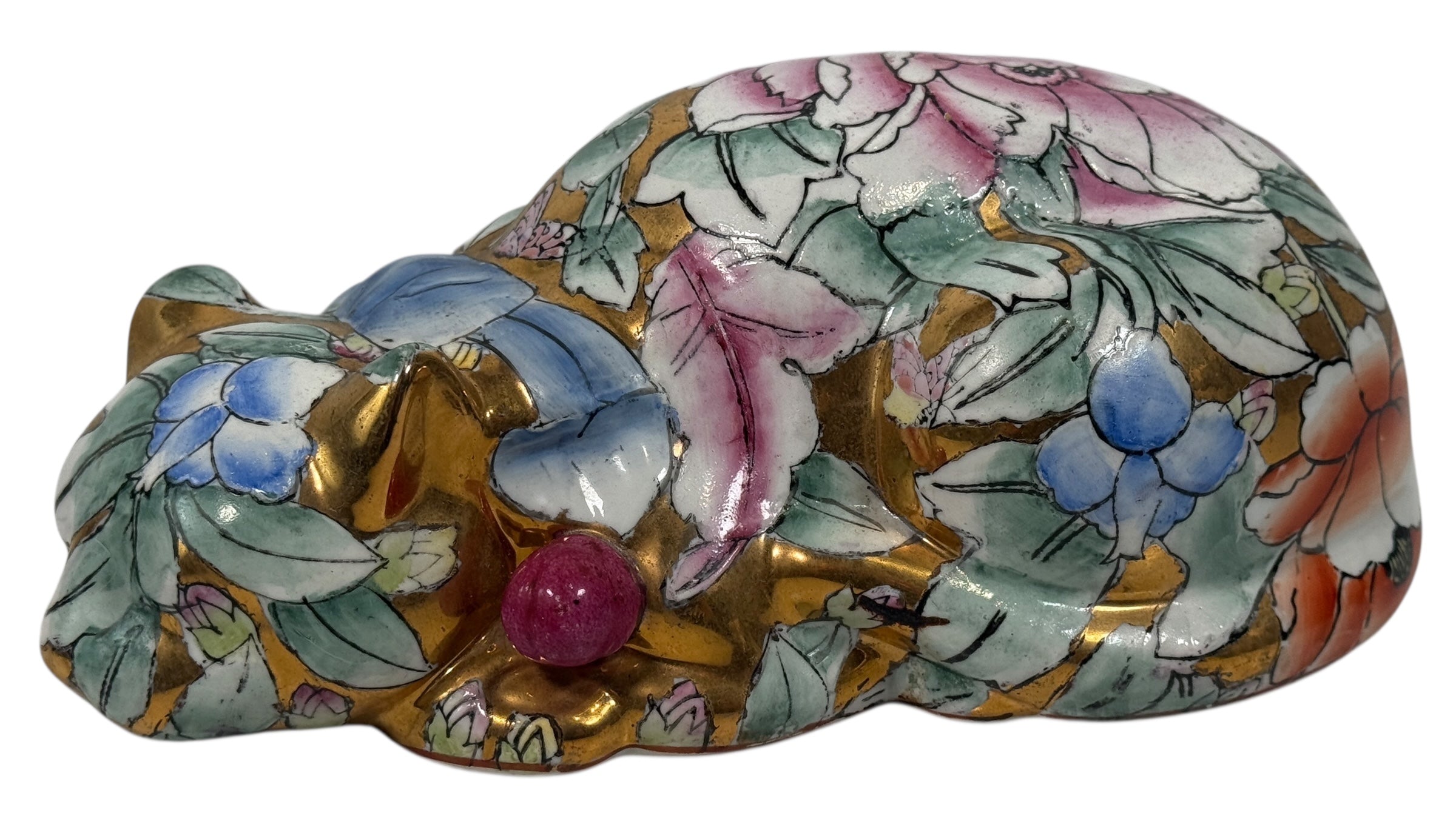 Large 10” Famille Rose porcelain reclining cat with floral enamels and gilt details. Mid-century Chinese export decor piece. Beautiful display sculpture.