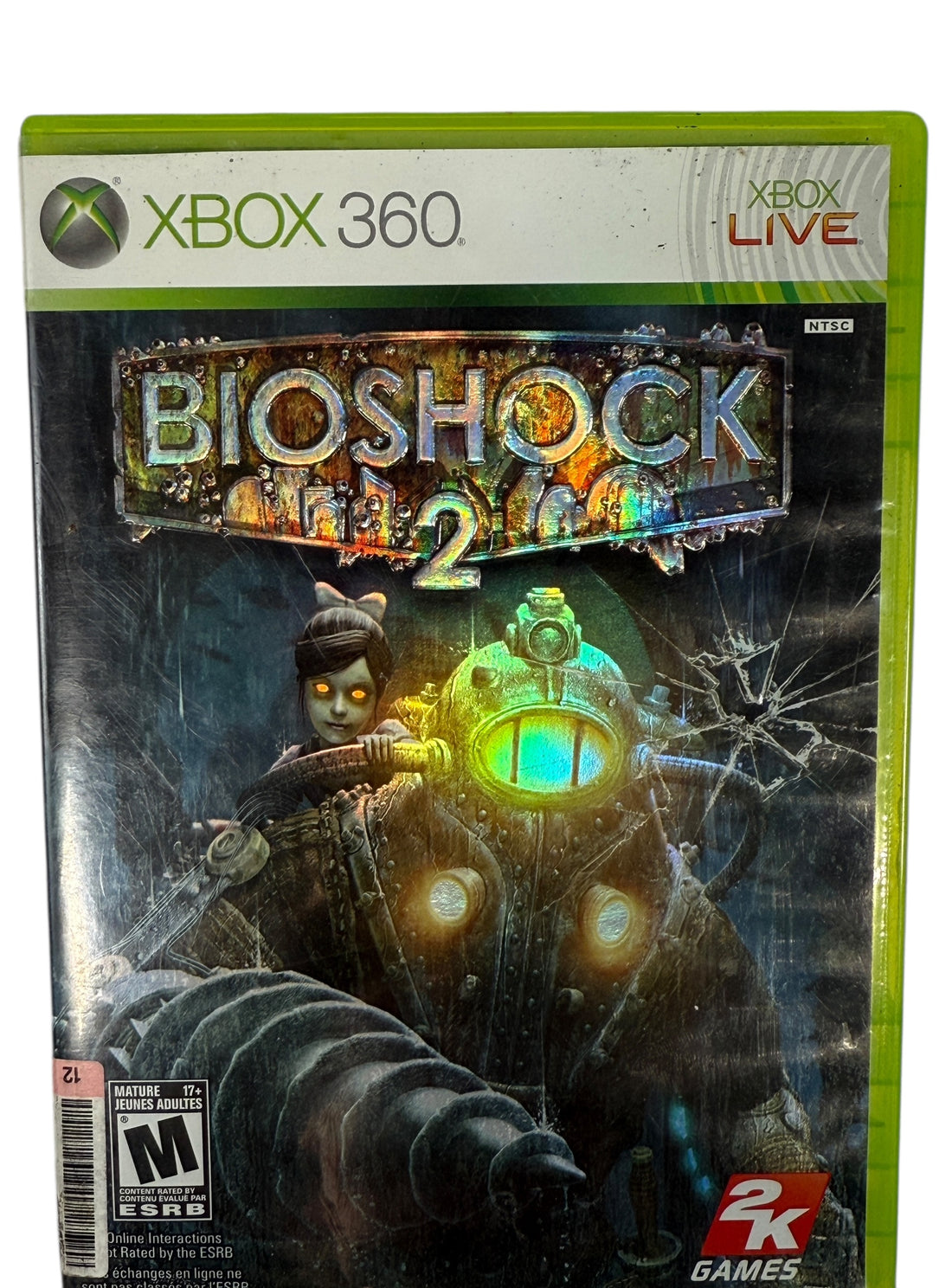 BioShock 2 Xbox 360 complete with disc and manual. NTSC edition in good working condition. Classic action shooter in Rapture. Fast Canadian shipping.