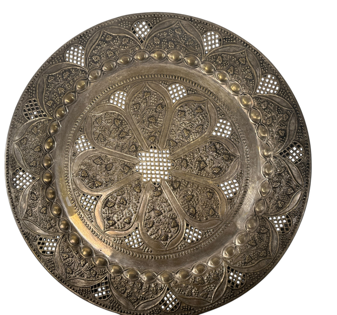 Vintage 24” solid brass tray made in India with hand-chased floral design and pierced edging. Ideal for décor or table use. Classic mid-century export piece.