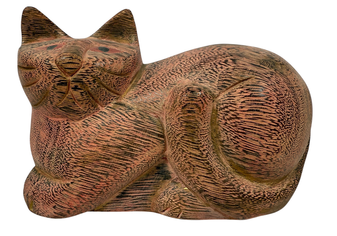 Hand-carved wooden cat sculpture in folk art style. Solid wood, decorative carved texture, warm natural finish. Unique décor piece for cat lovers.