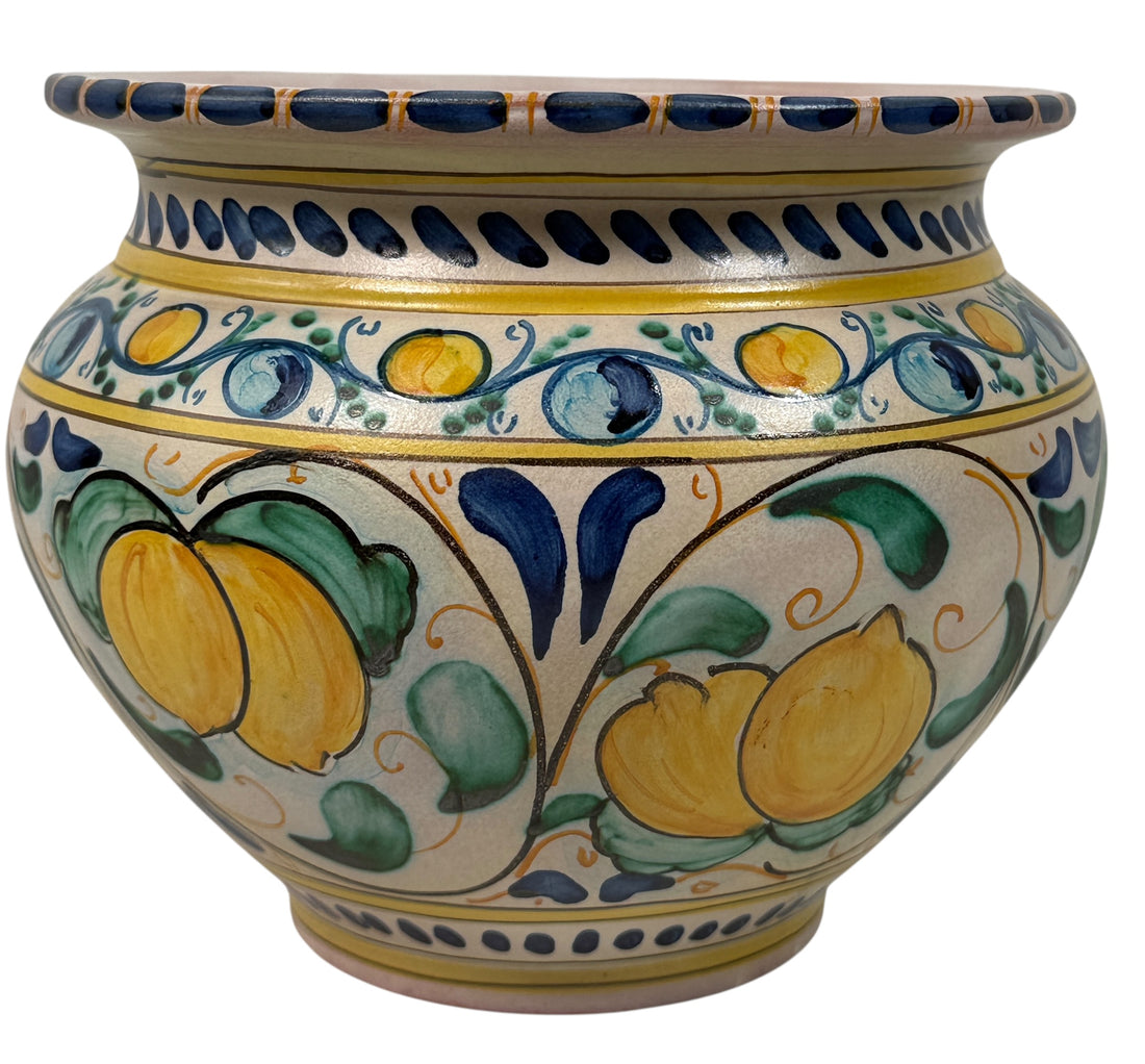 Hand-painted Spanish ceramic planter in blue and yellow majolica style. Vintage decorative cachepot with folk-art charm, ideal for plants or display.