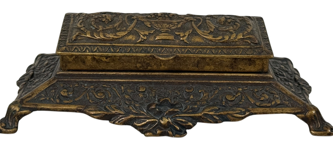 Vintage Italian cast metal desk stamp box in antique Victorian style with divided interior and aged bronze finish. Decorative postal desk accessory.