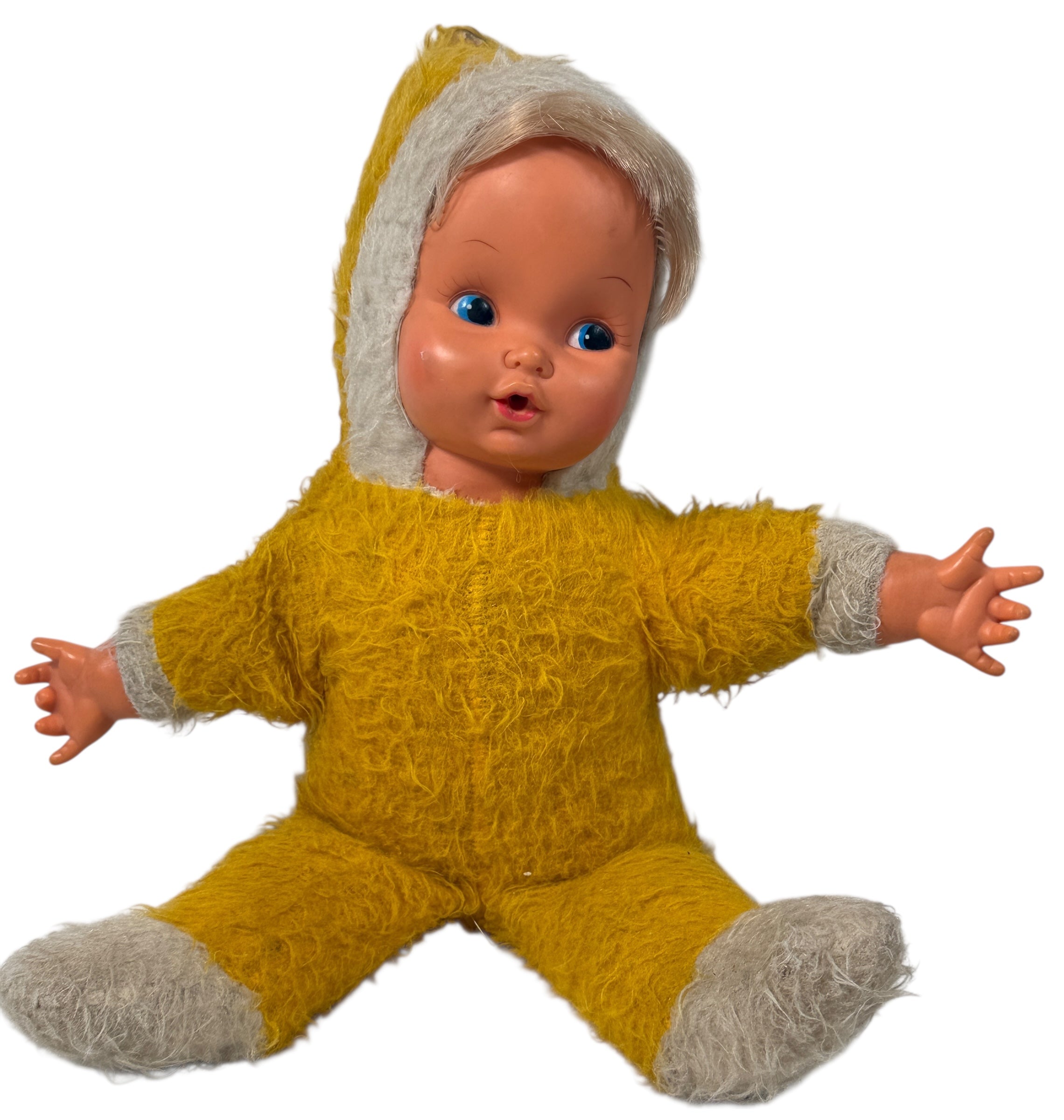 Vintage 1950s wind-up musical baby doll in yellow plush suit with vinyl face. Music plays well. Great display collectible. Ships from Canada.