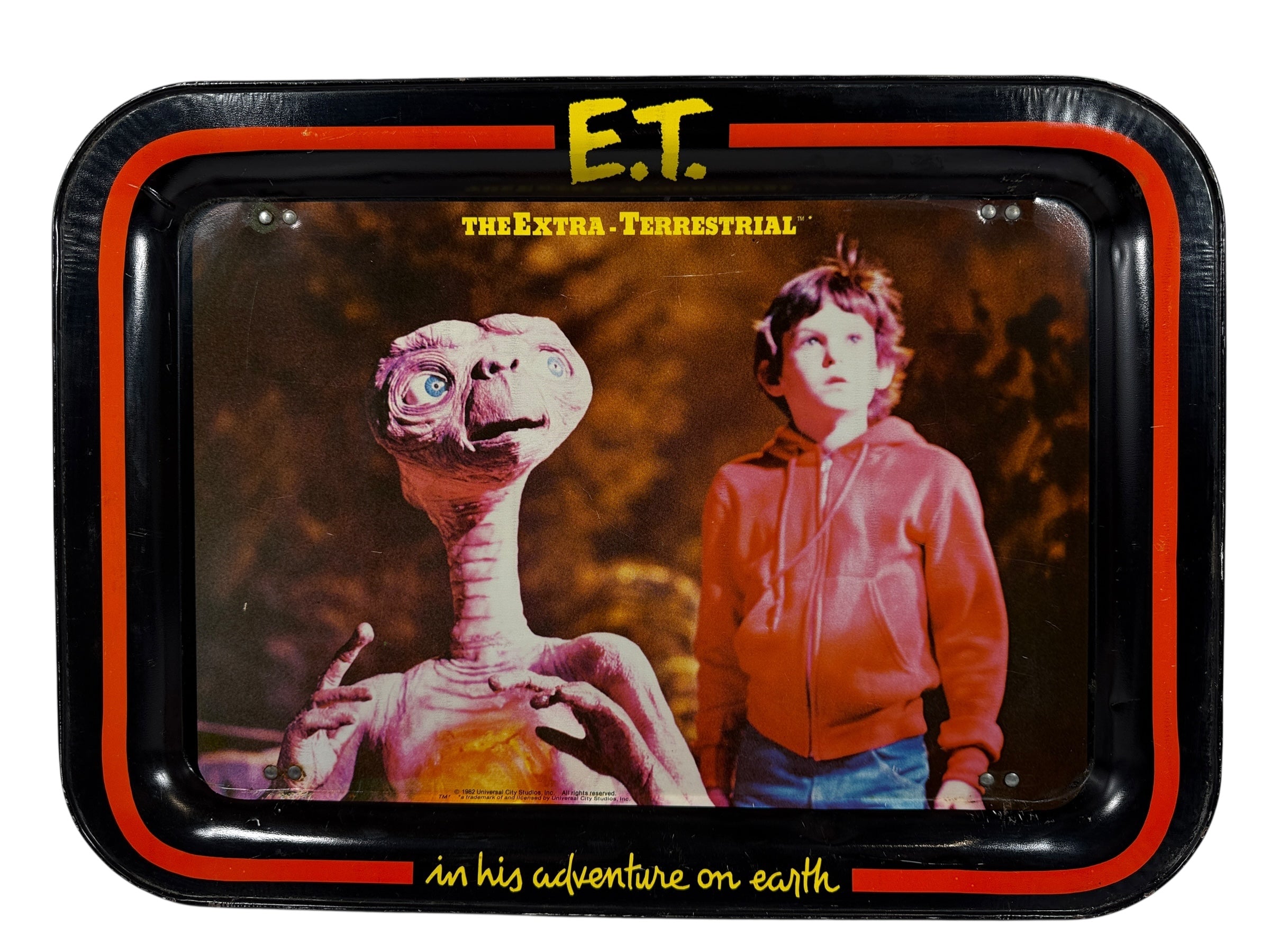 Metal tray with E.T. and a human figure from the movie 'E.T. the Extra-Terrestrial'.