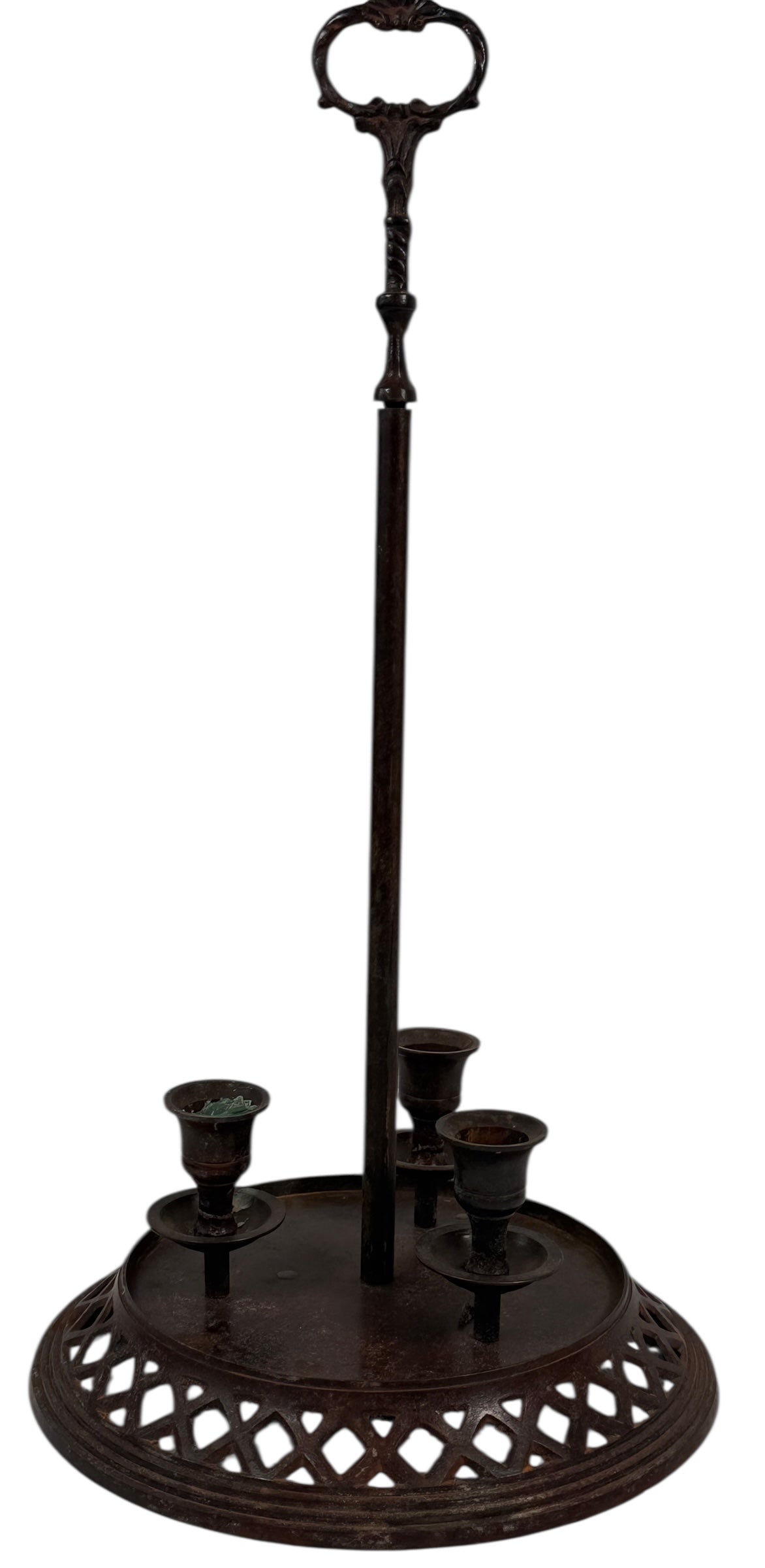 Decorative metal stand with candle holders on a white background