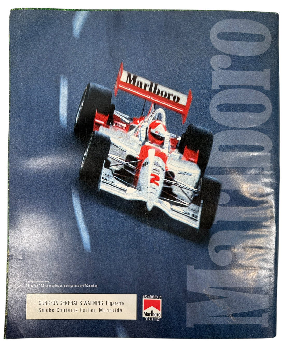 Marlboro-sponsored Formula 1 car on a blue background with Marlboro branding.