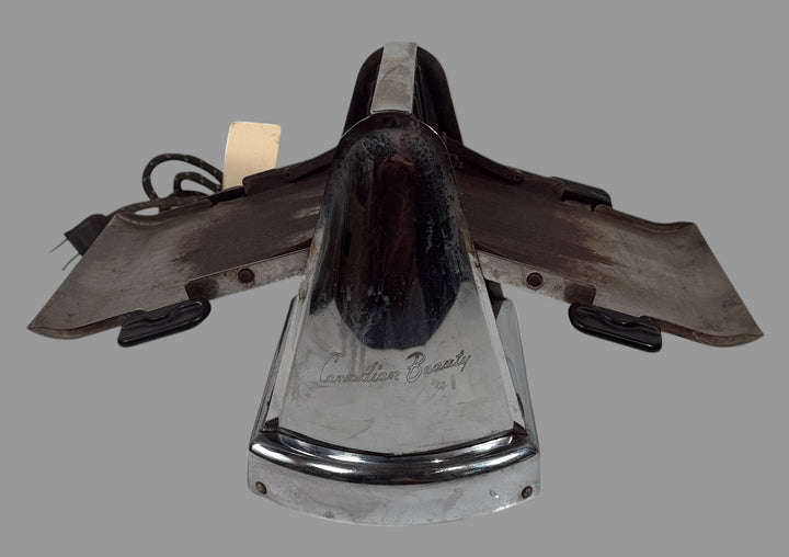 Vintage-style lamp with metallic finish and wooden shade on a white background