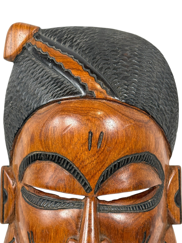 Hand-carved African wooden mask, 15″ tall, Ghana origin. Authentic tribal-style folk art wall décor. Excellent condition, solid wood.
