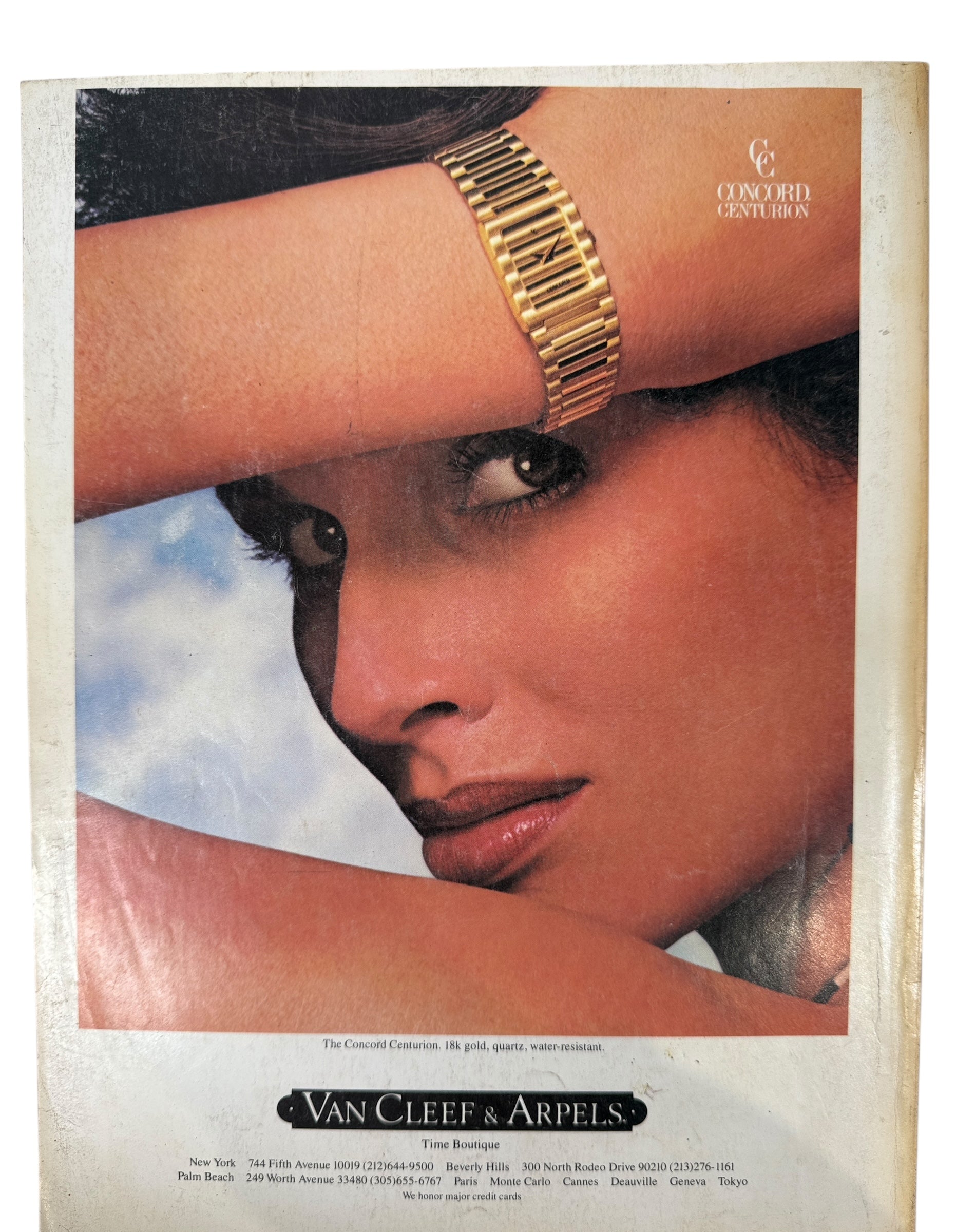Vintage Vogue September 1982, magazine cover with a woman's face and text about fashion and collections.