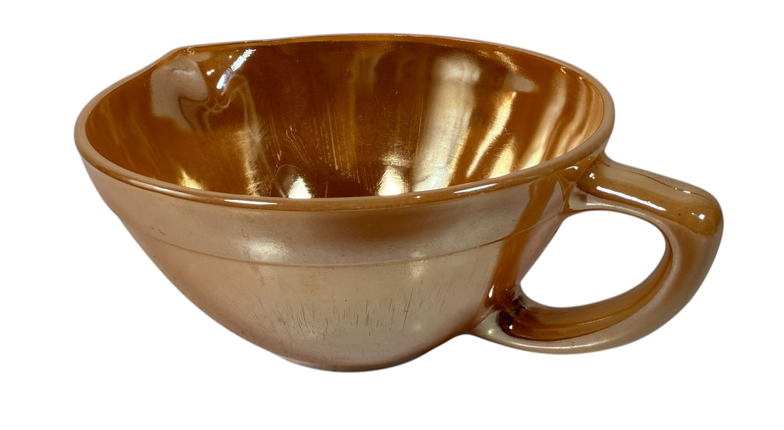 Vintage Fire-King Peach Luster mixing bowl with handle &amp; spout. Classic 1950s oven-proof milk glass collectible. Perfect for retro kitchens or display.