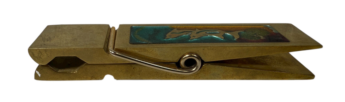 Vintage 1970s brass oversized clothespin clip with colorful enamel inset—5¾″ desk paperweight or décor accent. Mid-century modern charm.