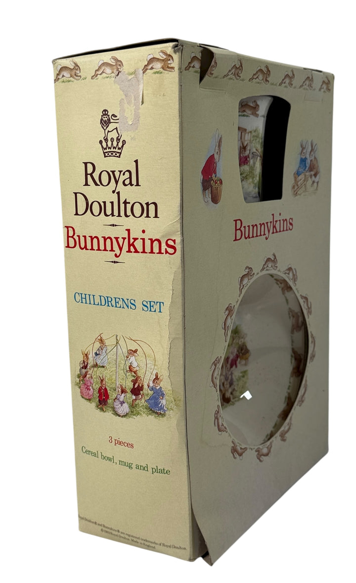 1989 Royal Doulton Bunnykins 3-piece children’s set made in England. Vintage boxed bone china with charming nursery scenes.