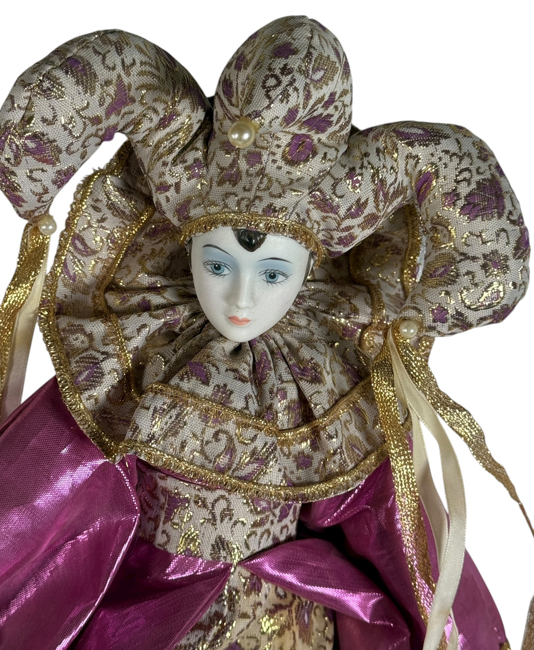 Vintage 18″ porcelain jester doll with mint satin and brocade costume. Elegant décor piece with porcelain head, hands, and feet.