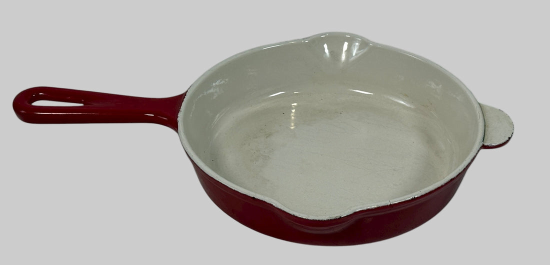 Vintage Cousances Le Creuset #16 enameled cast iron skillet in Flame red. French-made, functional with vintage wear. Great for cooking or display.