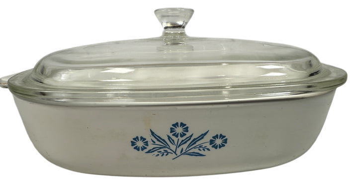 Vintage Corning Ware P-9 Blue Cornflower 9-inch casserole with glass lid. Canadian-made pyroceram cookware. Clean interior and functional vintage condition.