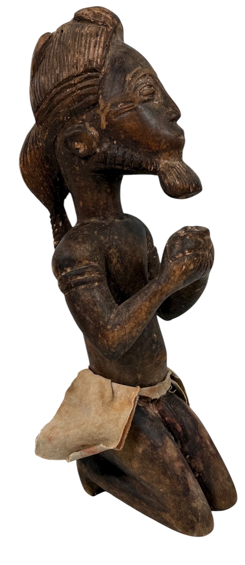 Mid-century African Baule-style carved kneeling figure with aged patina and cloth wrap. Vintage West African sculpture, approx. 11 inches tall.