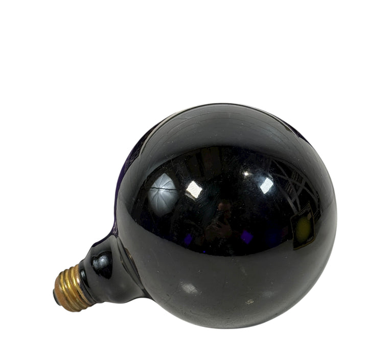 Purple glass globe bulb in working condition. Ideal for décor, mood lighting, or collectors. Tested, solid glass, E26 base.