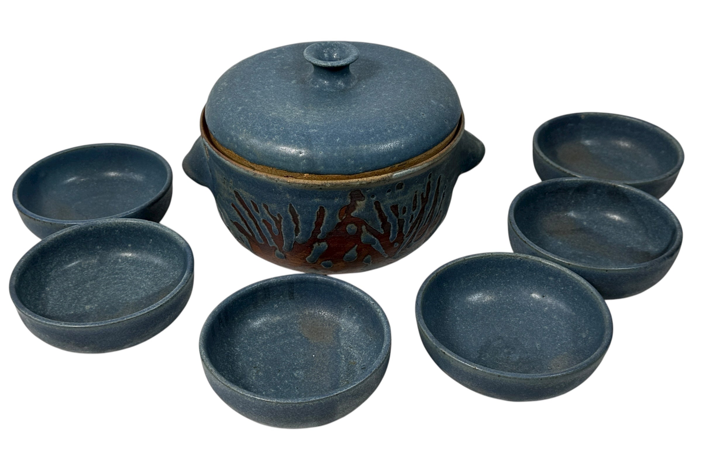 Handmade Québec studio pottery set signed Achard. Includes carved casserole with lid and six blue bowls. Vintage artisan ceramic tableware in excellent condition.