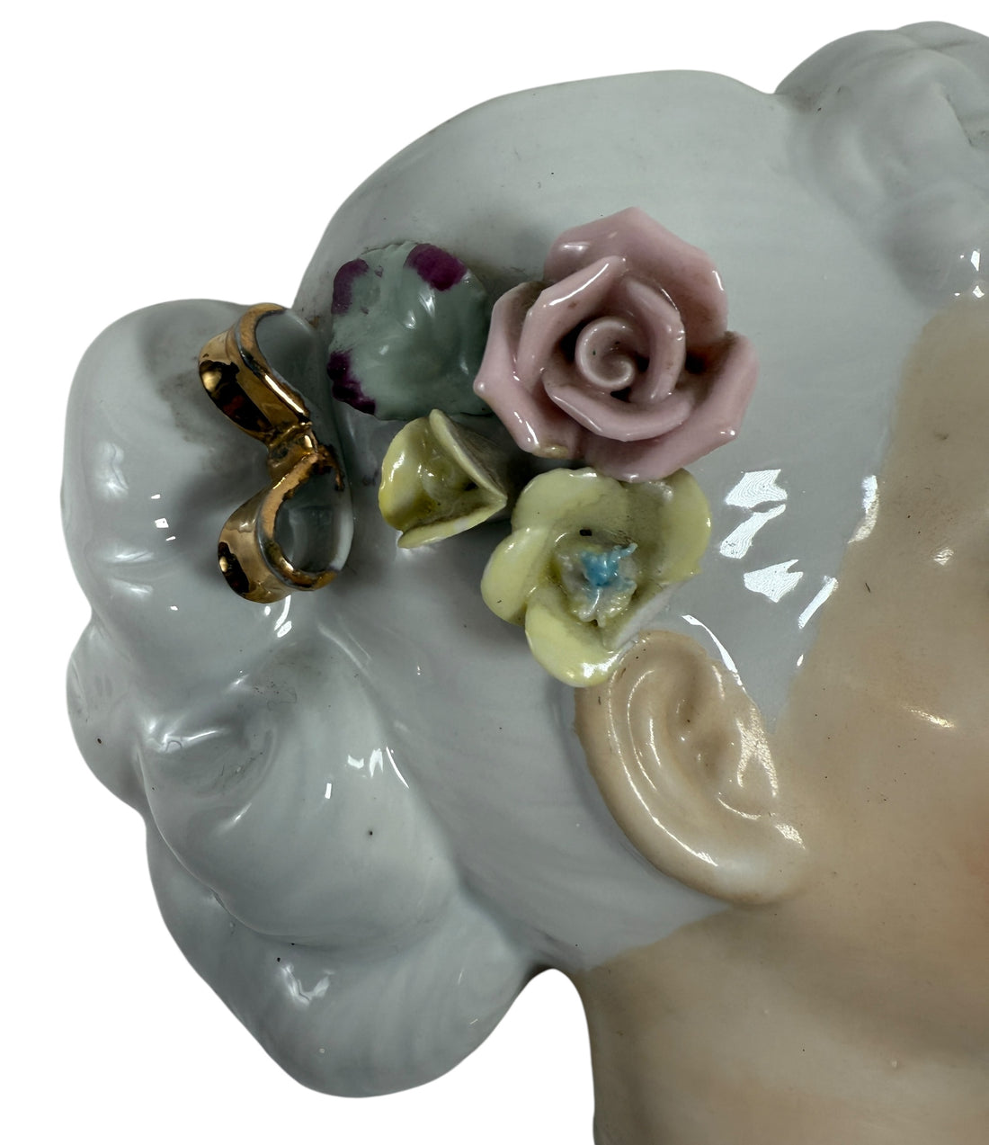 Mid-century Japanese porcelain lady-head wall mask with floral accents. Vintage décor piece with one chipped flower. Ideal for collectors and retro interiors.