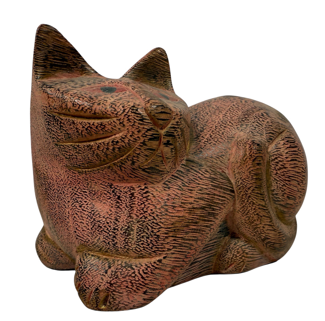 Hand-carved wooden cat sculpture in folk art style. Solid wood, decorative carved texture, warm natural finish. Unique décor piece for cat lovers.
