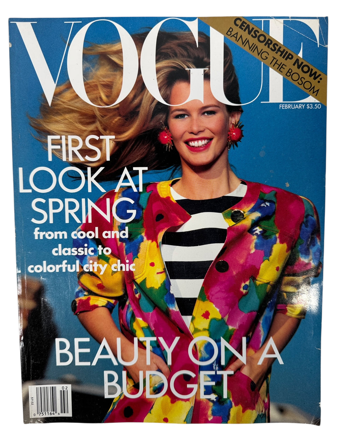 Vintage Vogue February 1991 issue featuring Claudia Schiffer, GUESS editorial, and iconic early 90s fashion and Absolut Chicago advertising.