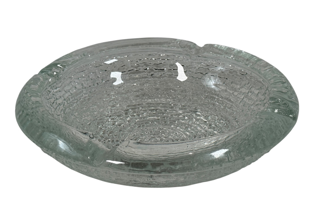 Vintage Iittala Ultima Thule glass ashtray by Tapio Wirkkala, 8 inch diameter. Iconic Finnish modernist pressed glass design.