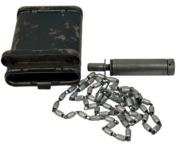 WWII German RG34 cleaning kit dated 1940 for K98k MG34. Complete with tin chain tool and wick. Original wartime issue with field wear. Collectible militaria.